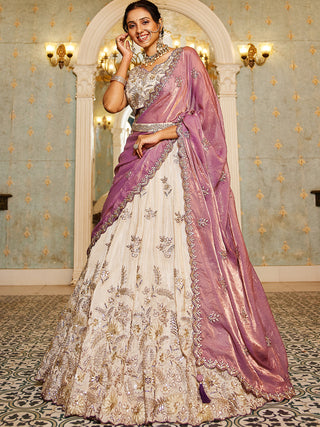 Beige Color Golden Sequined Using Thread,Coding & Zarkans Embroidered Viscos Semi-Stitched Lehenga choli with Contrast Dupatta