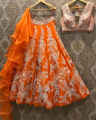 Elegant Orange Lehenga with pearls, sequins lace work