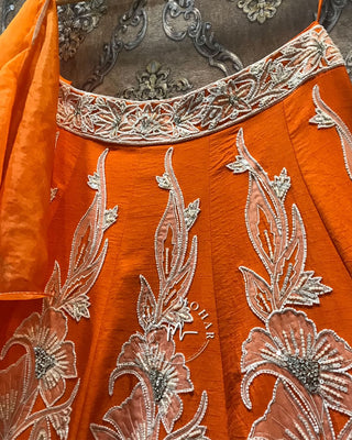 Elegant Orange Lehenga with pearls, sequins lace work