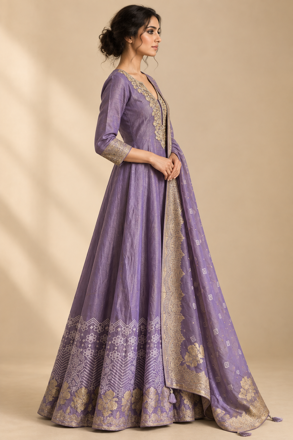 Side-profile view of dusty lavender embroidered gown and matching motif dupatta