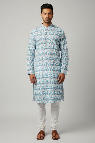 Male model wearing teal geometric print kurta set with kolhapuri sandals - front pose