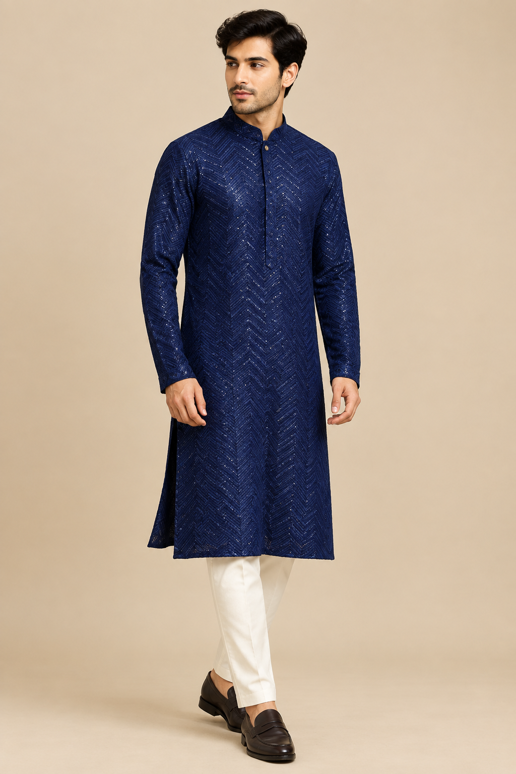 Single full-length three-quarter view of model wearing navy patterned kurta