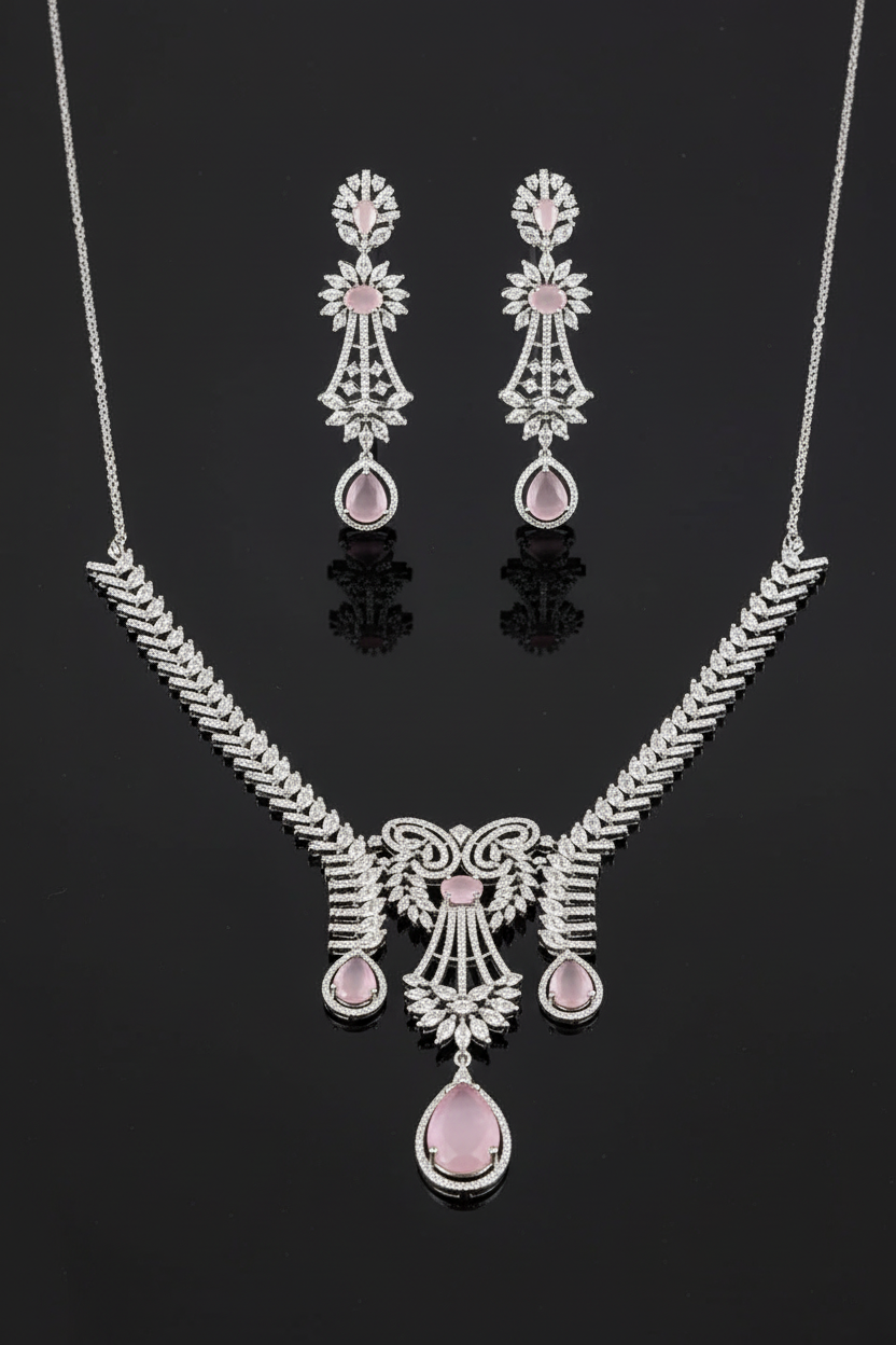 Shreya silver-tone necklace set with pale pink stones displayed on mirror-black glass