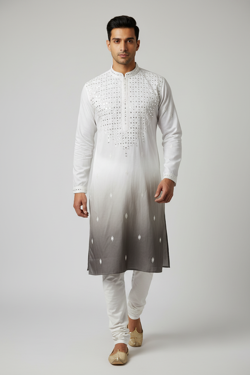 Male model wearing white ombre sequin kurta set with gold juttis - walking pose