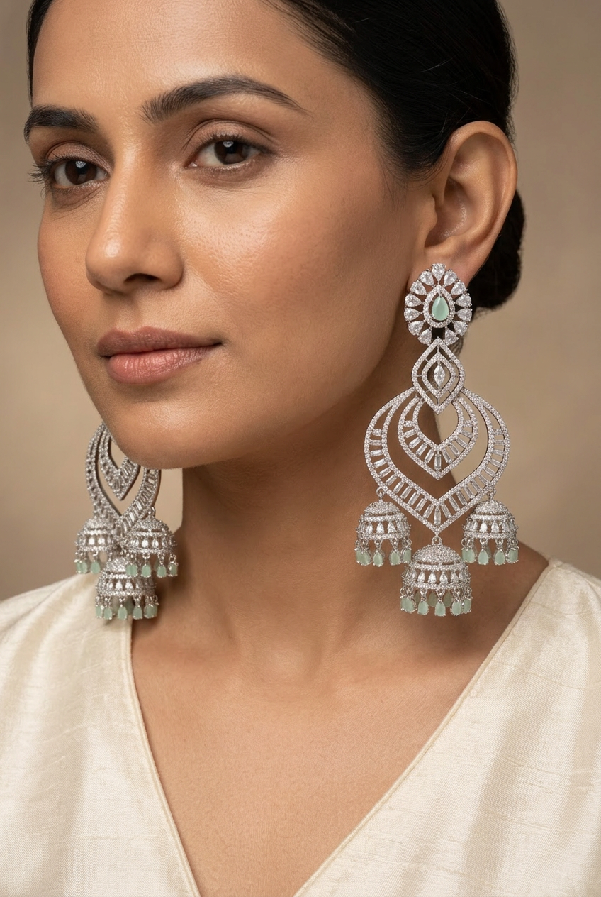 Model wearing the mint chandelier earrings