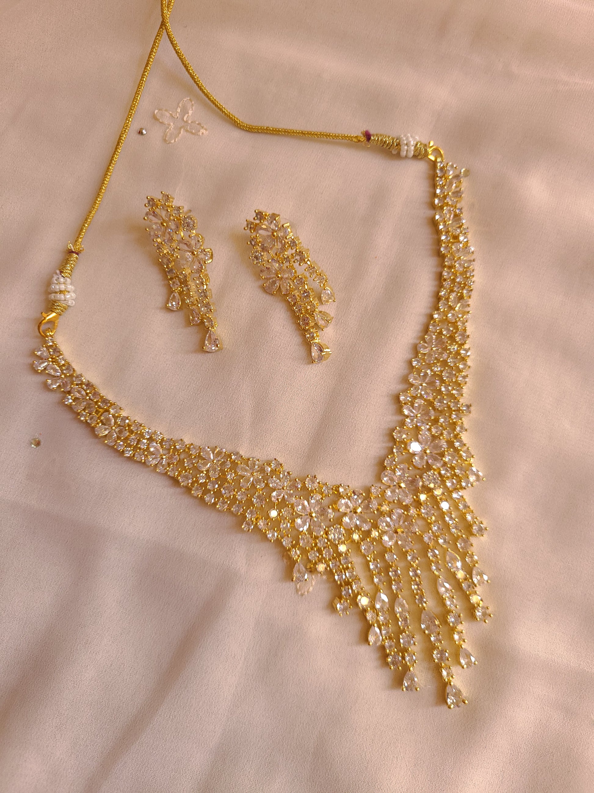 MOHAR statement floral crystal and cubic zirconia necklace set in gold-finish setting