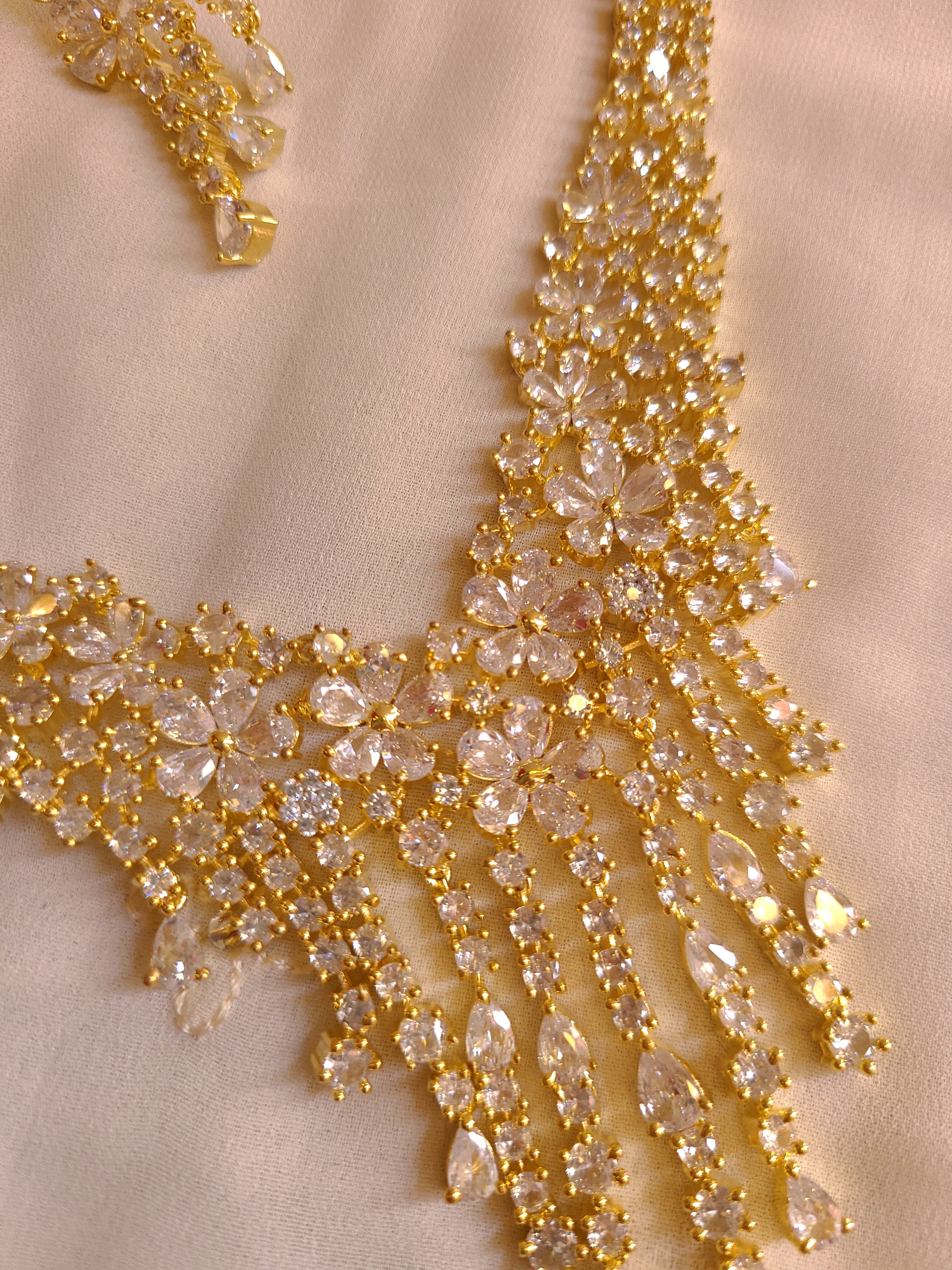 MOHAR statement floral crystal and cubic zirconia necklace set in gold-finish setting