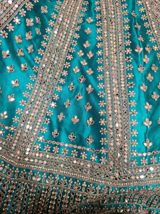 Turquoise Blue Bridal Lehenga with Silver Embroidery