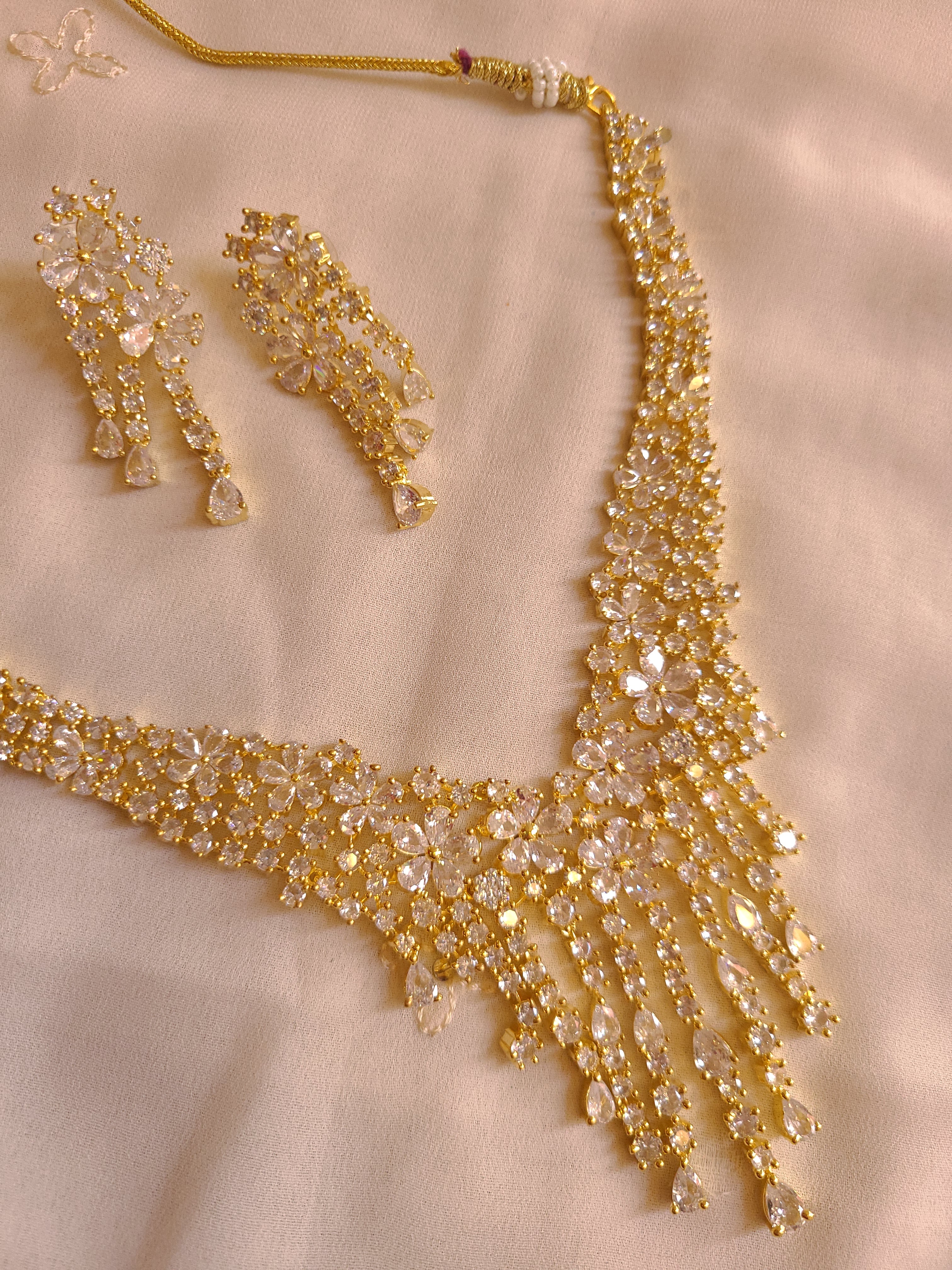 MOHAR statement floral crystal and cubic zirconia necklace set in gold-finish setting