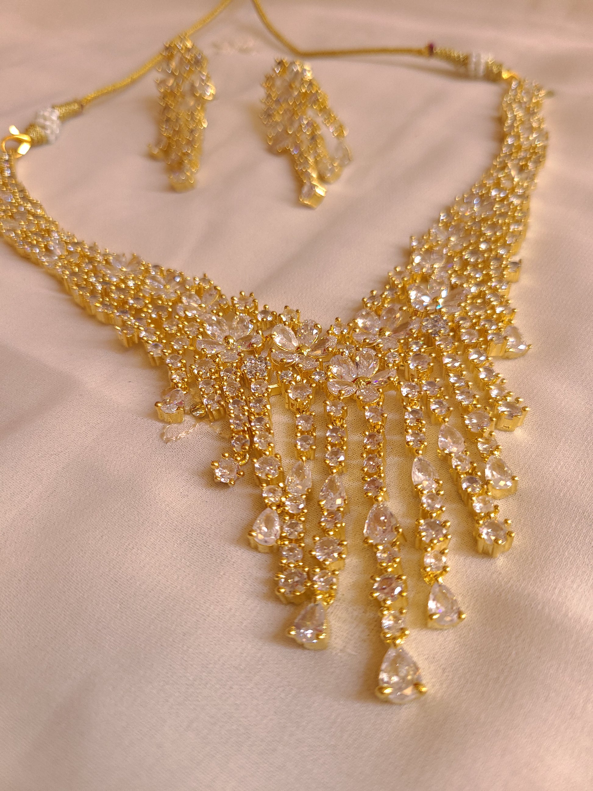 MOHAR statement floral crystal and cubic zirconia necklace set in gold-finish setting