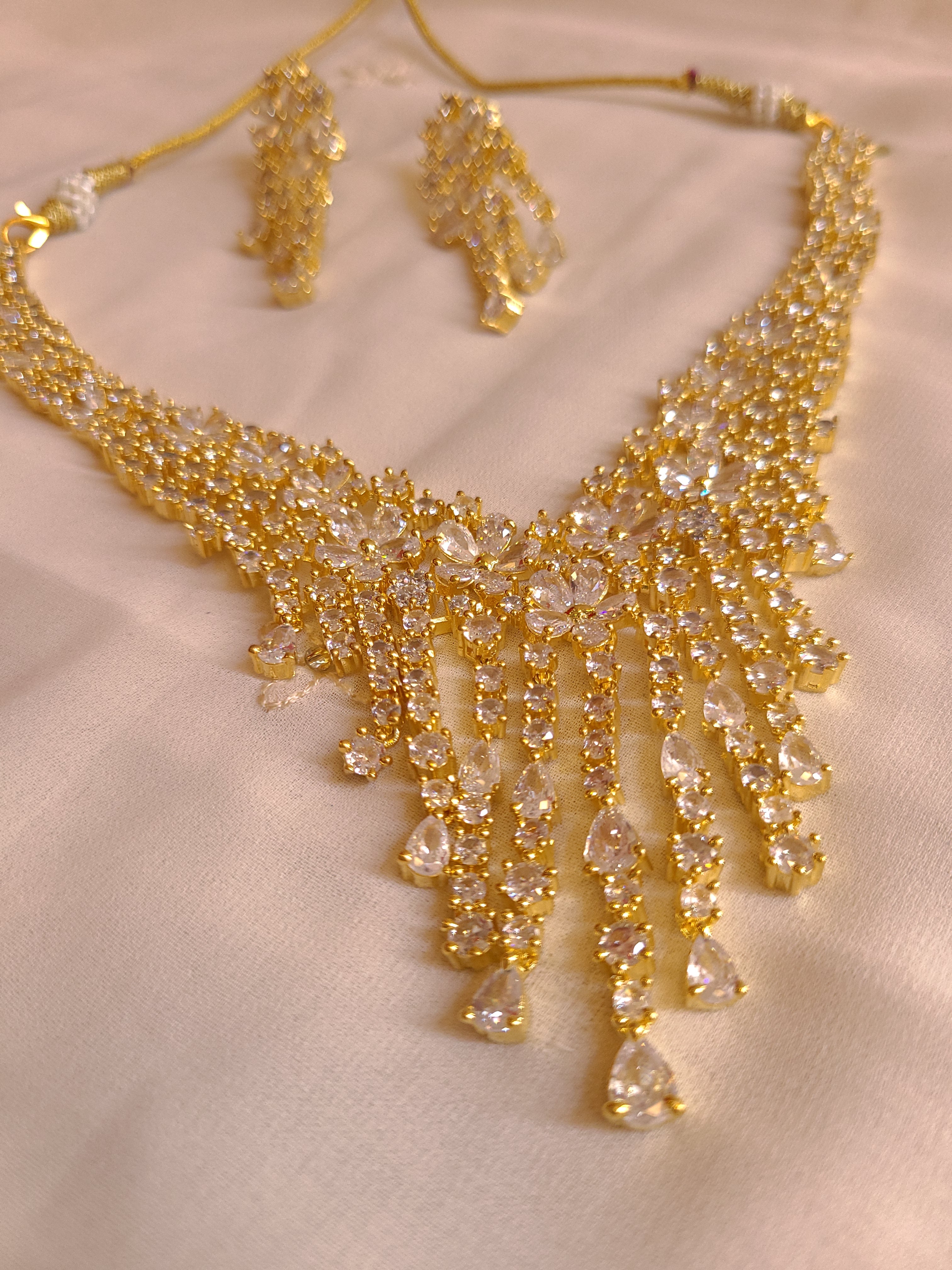 MOHAR statement floral crystal and cubic zirconia necklace set in gold-finish setting