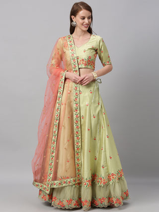 Pastel green Silk Lehenga with embroidered net frill hem