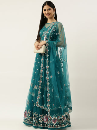 Dark sea green thread embroidered net Lehenga