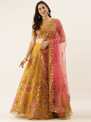 Mustard net Lehenga with gold sequins and pink rose motifs