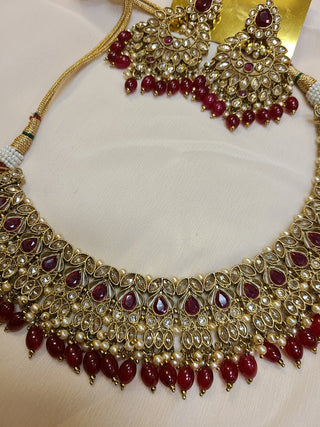 Ruby and Champagne color crystal heavy necklace set with maang tikka
