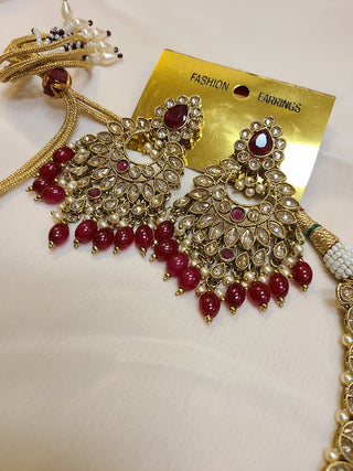 Ruby and Champagne color crystal heavy necklace set with maang tikka