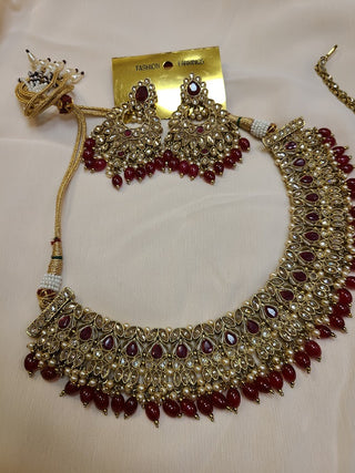 Ruby and Champagne color crystal heavy necklace set with maang tikka