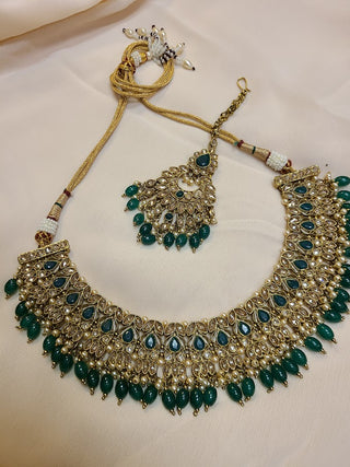 Emerald and Champagne color crystal heavy necklace set with maang tikka
