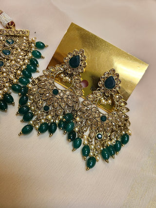 Emerald and Champagne color crystal heavy necklace set with maang tikka