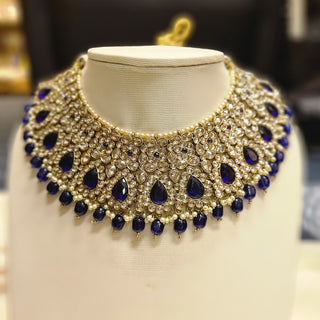 Blue sapphire and Champagne color crystal heavy necklace set with maang tikka