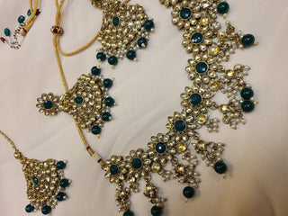 Blue sapphire and Champagne color crystal floral pattern necklace set with maang tikka