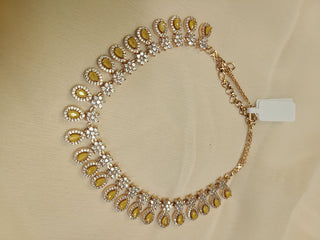 Delicate AD set with yellow crystals in Gold Finish