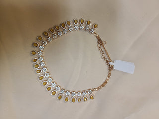 Delicate AD set with yellow crystals in Gold Finish