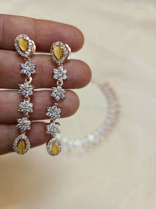 Delicate AD set with yellow crystals in Gold Finish