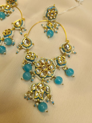 Long Statement Floral Kundan and Pearl Bali  earrings in Blue