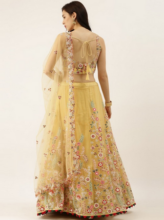 Embroidered bright yellow Net Lehenga set