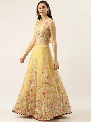 Embroidered bright yellow Net Lehenga set