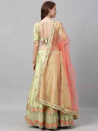 Pastel green Silk Lehenga with embroidered net frill hem