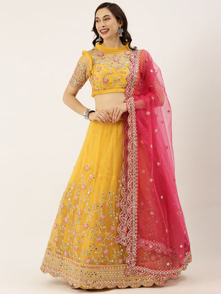 Floral sequin and mirror embroidered mustard yellow Net Lehenga