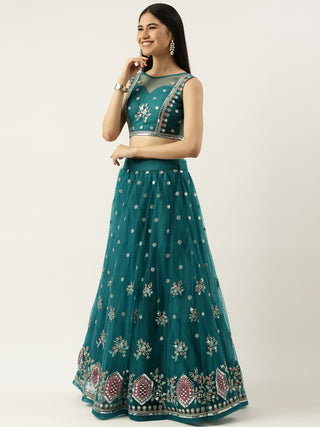 Dark sea green thread embroidered net Lehenga