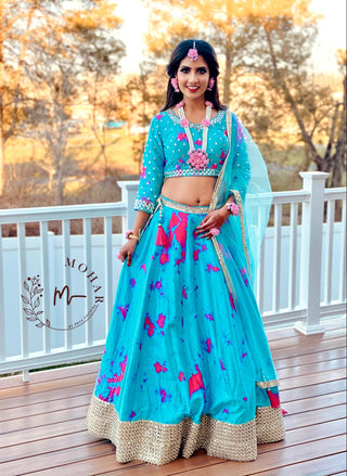 Mirror work tie-dye lehenga.